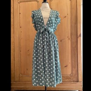 Green and white polka dot dress